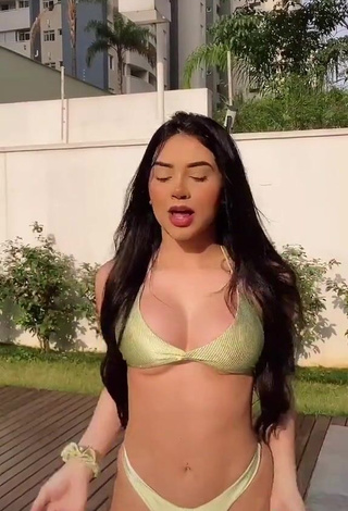 Erotic Tainá Costa in Golden Bikini