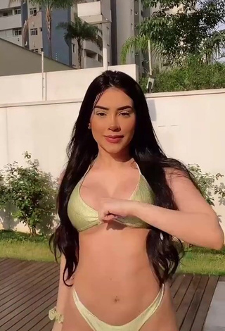 3. Erotic Tainá Costa in Golden Bikini