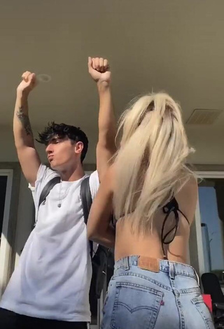 Beautiful Tana Mongeau in Sexy Black Bikini Top