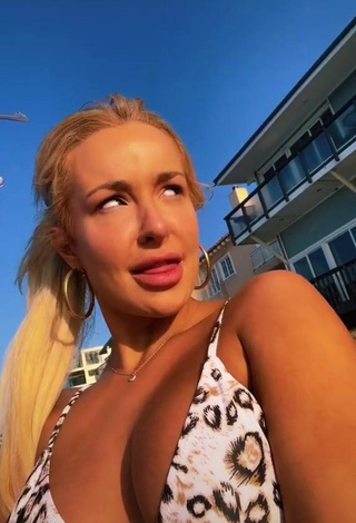 1. Irresistible Tana Mongeau in Bikini Top at the Beach