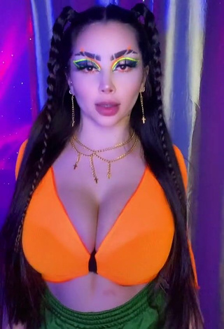 Erotic Vai Monroe Shows Cleavage in Orange Crop Top and Bouncing Boobs