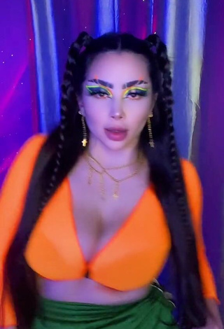 3. Erotic Vai Monroe Shows Cleavage in Orange Crop Top and Bouncing Boobs