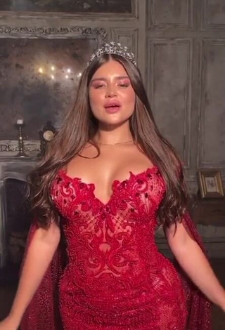 Erotic Valeriya Bearwolf Shows Cleavage in Red Dress