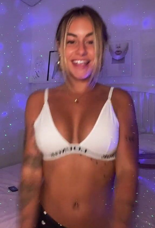 Captivating Abril Cols Shows Cleavage in White Sport Bra