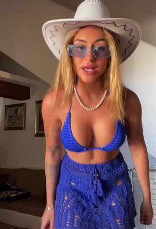 1. Irresistible Abril Cols Shows Cleavage in Blue Bikini Top (Underboob)