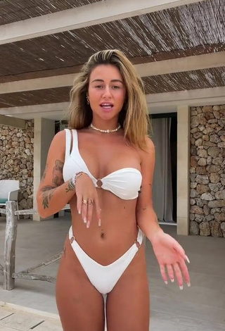 Amazing Abril Cols Shows Cleavage in Hot White Bikini