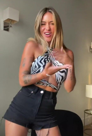 Pretty Abril Cols Shows Cleavage in Zebra Crop Top