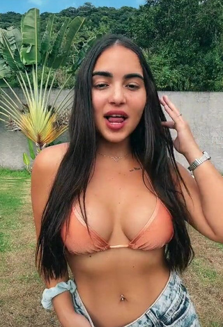 1. Beautiful Aline Borges Shows Cleavage in Sexy Peach Bikini Top