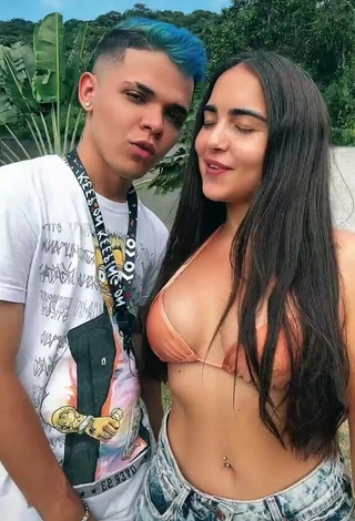 Beautiful Aline Borges Shows Cleavage in Sexy Peach Bikini Top