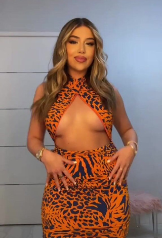 Captivating Amanda Díaz in Leopard Dress (Underboob)