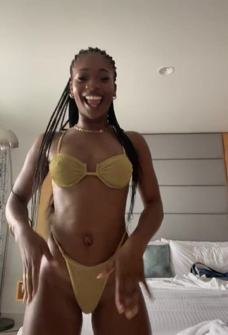 3. Captivating Angel Ogbonna in Golden Bikini