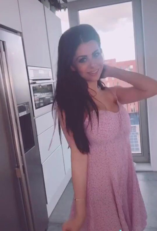 Erotic Azra Bajrami Shows Cleavage in Pink Dress