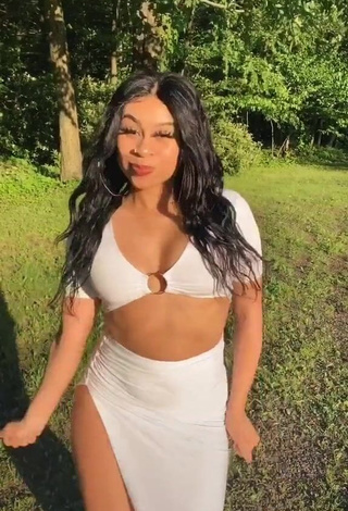 2. Sweetie BbygShai in White Crop Top