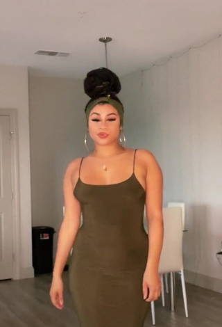 1. Sweetie BbygShai in Olive Dress