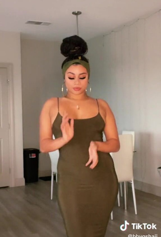 2. Sweetie BbygShai in Olive Dress