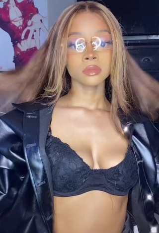 Irresistible Caeli Shows Cleavage in Black Bra