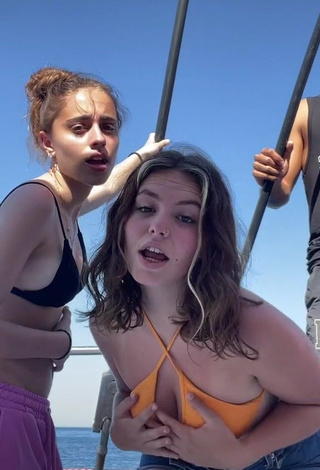 Cute Claudia García in Orange Bikini Top on a Boat