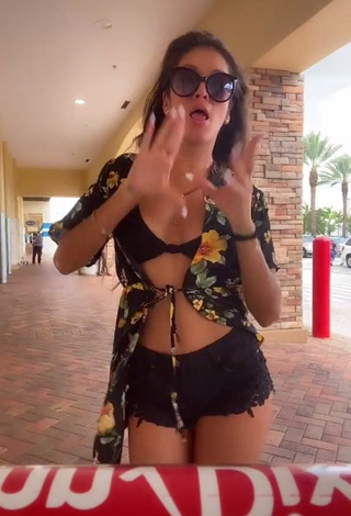 3. Erotic Andrea Shows Cleavage in Black Bikini Top