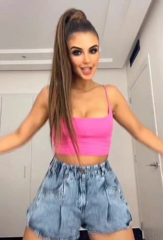 Cute Dayanara Peralta Shows Cleavage in Pink Crop Top